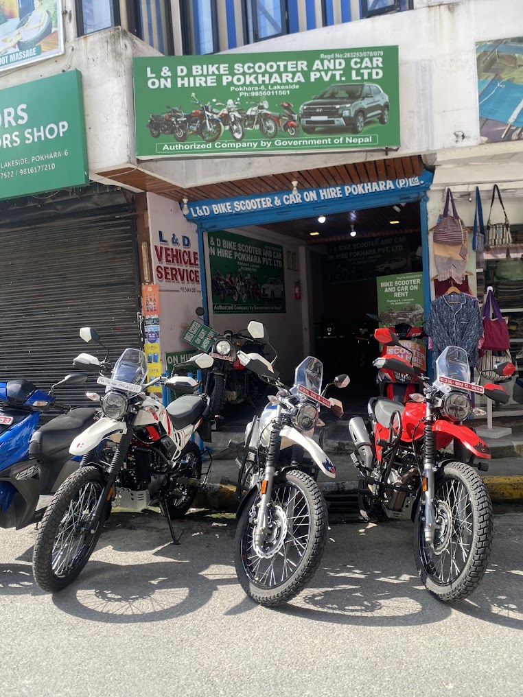Customer service desk with friendly staff member assisting customer